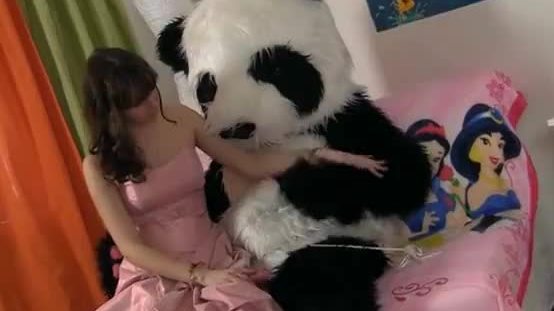 Young fairy revived toy panda and suck